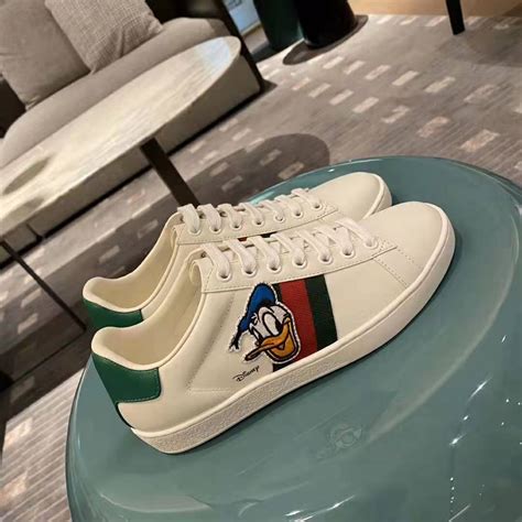 sneakers gucci x disney|Gucci Disney donald duck shoes.